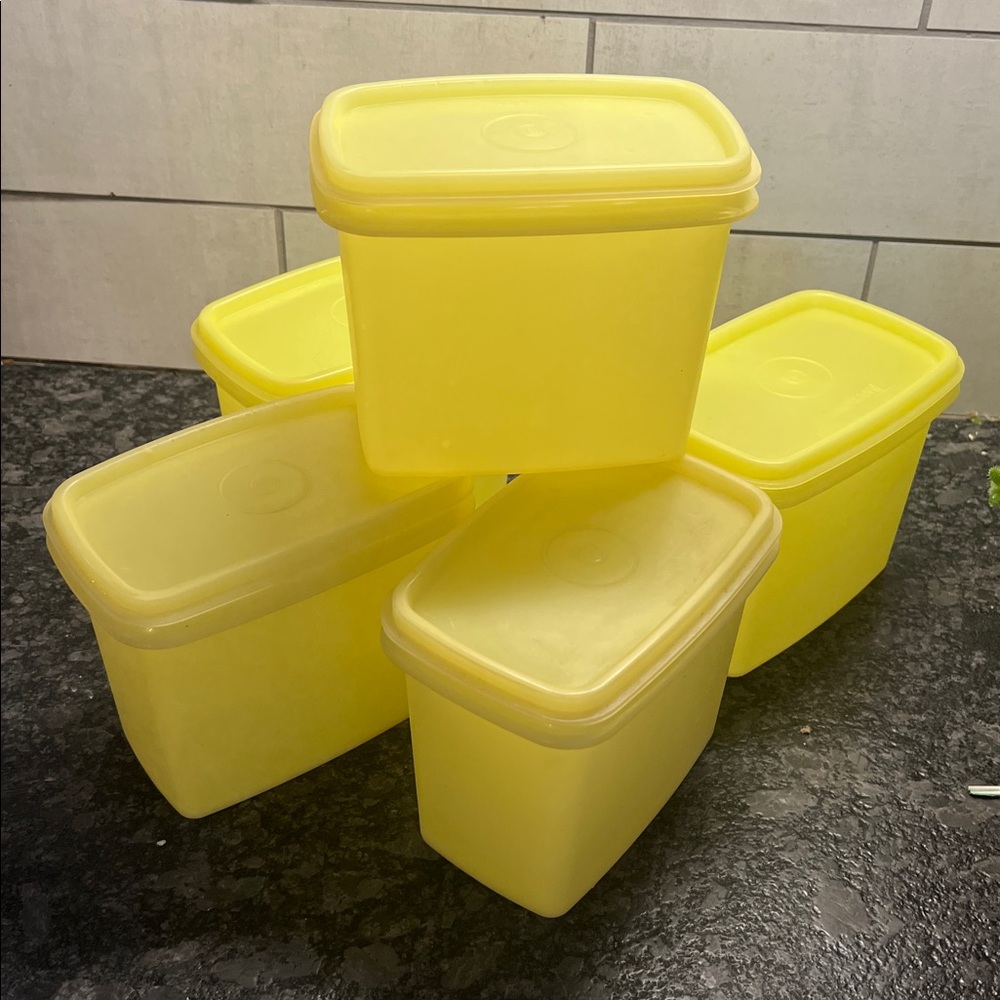 5 piece set of yellow storage containers by Tupperware. Vintage pieces e…